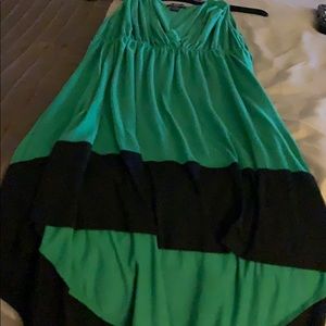 A green and black high and low dress.